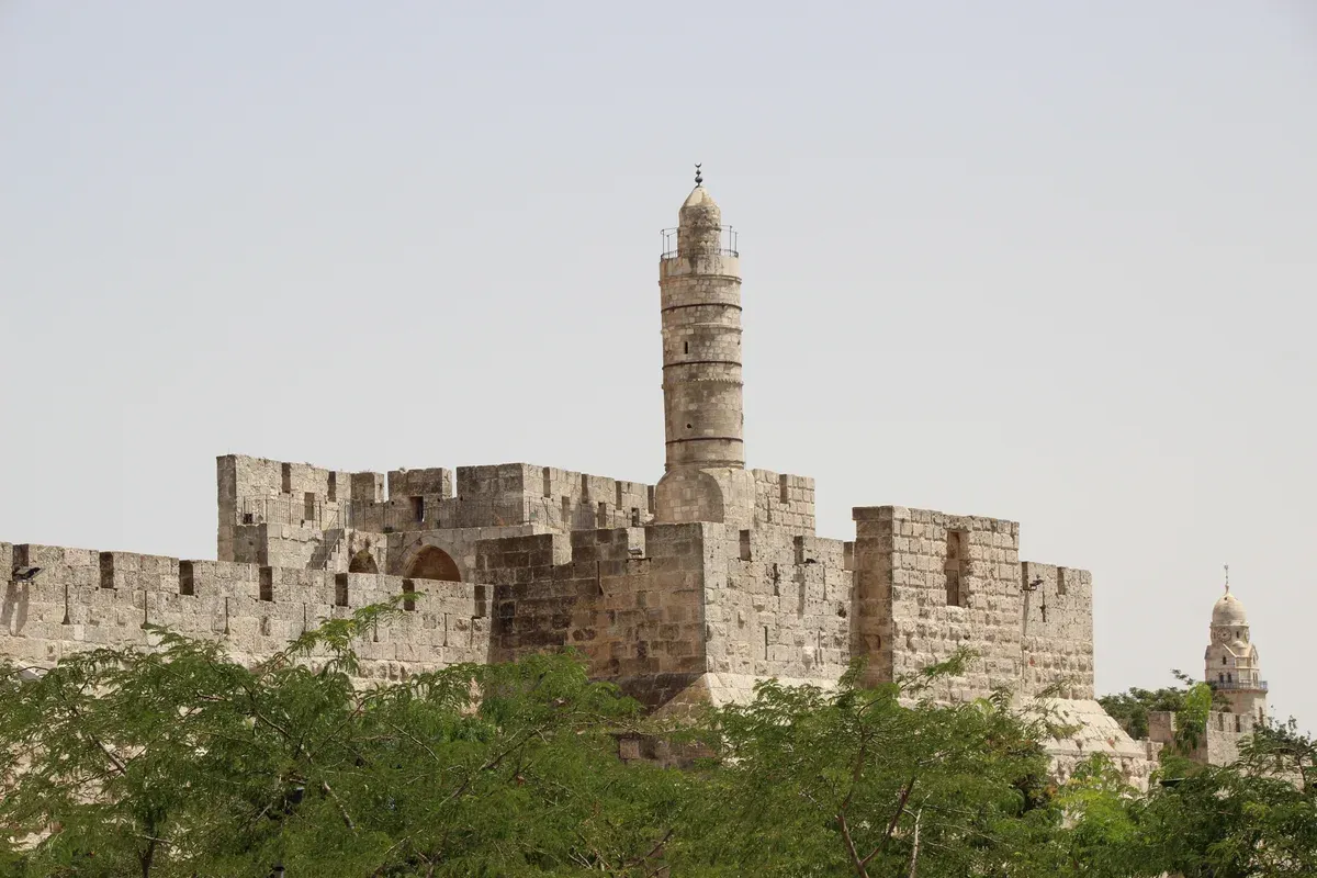 The minaret of the Tower of David citadel above the walls, passed on a Jerusalem Old City tour from Jaffa Gate